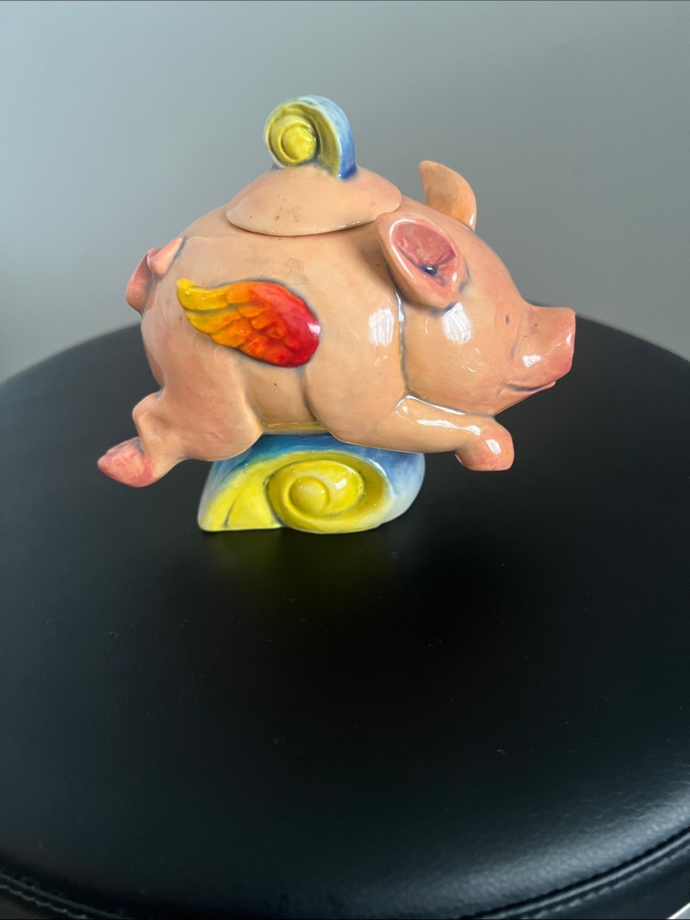 Ceramic Flying Pig Canister in Peach with Rainbow Accents